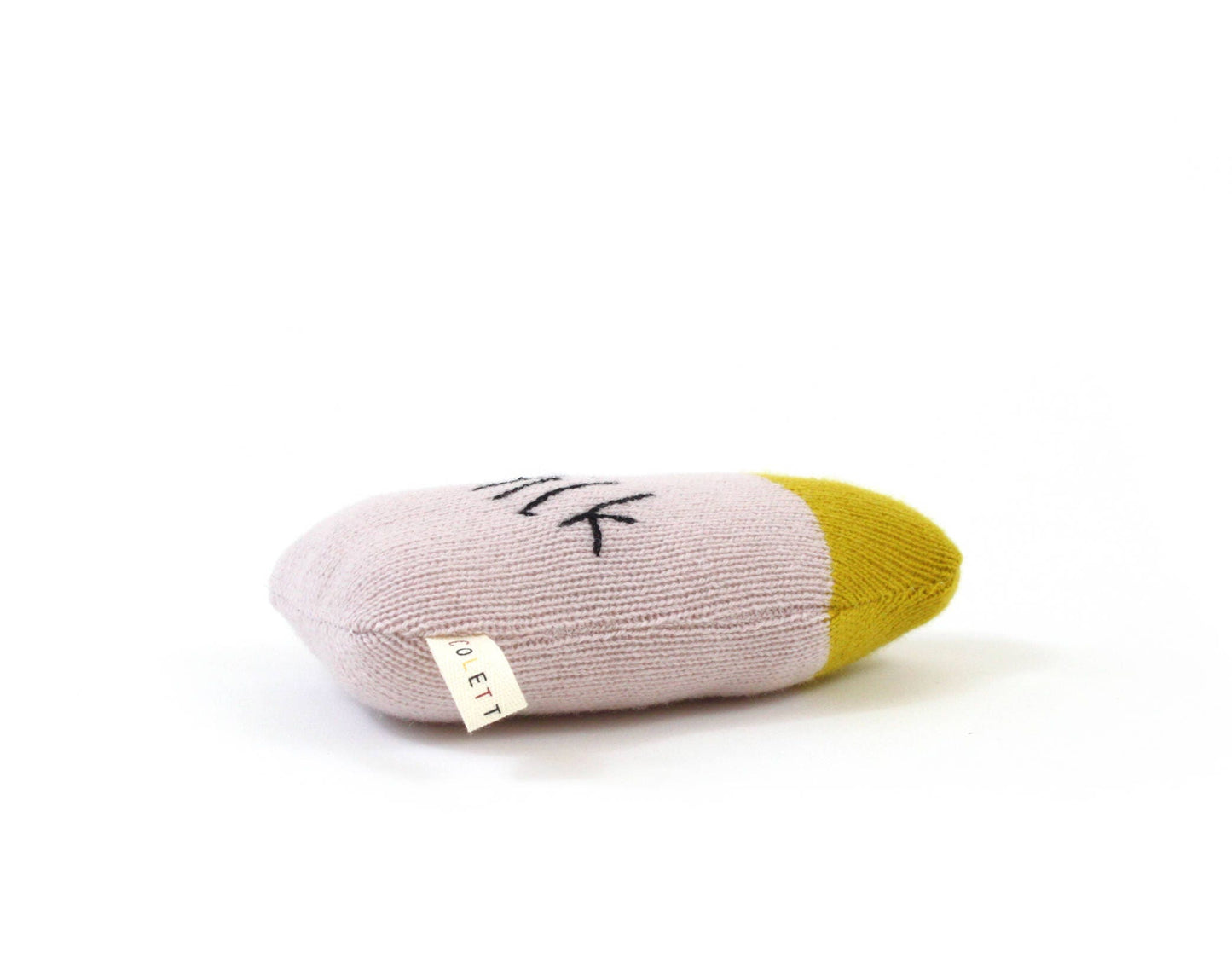 Knitted baby rattle with yellow and pink design on a white background