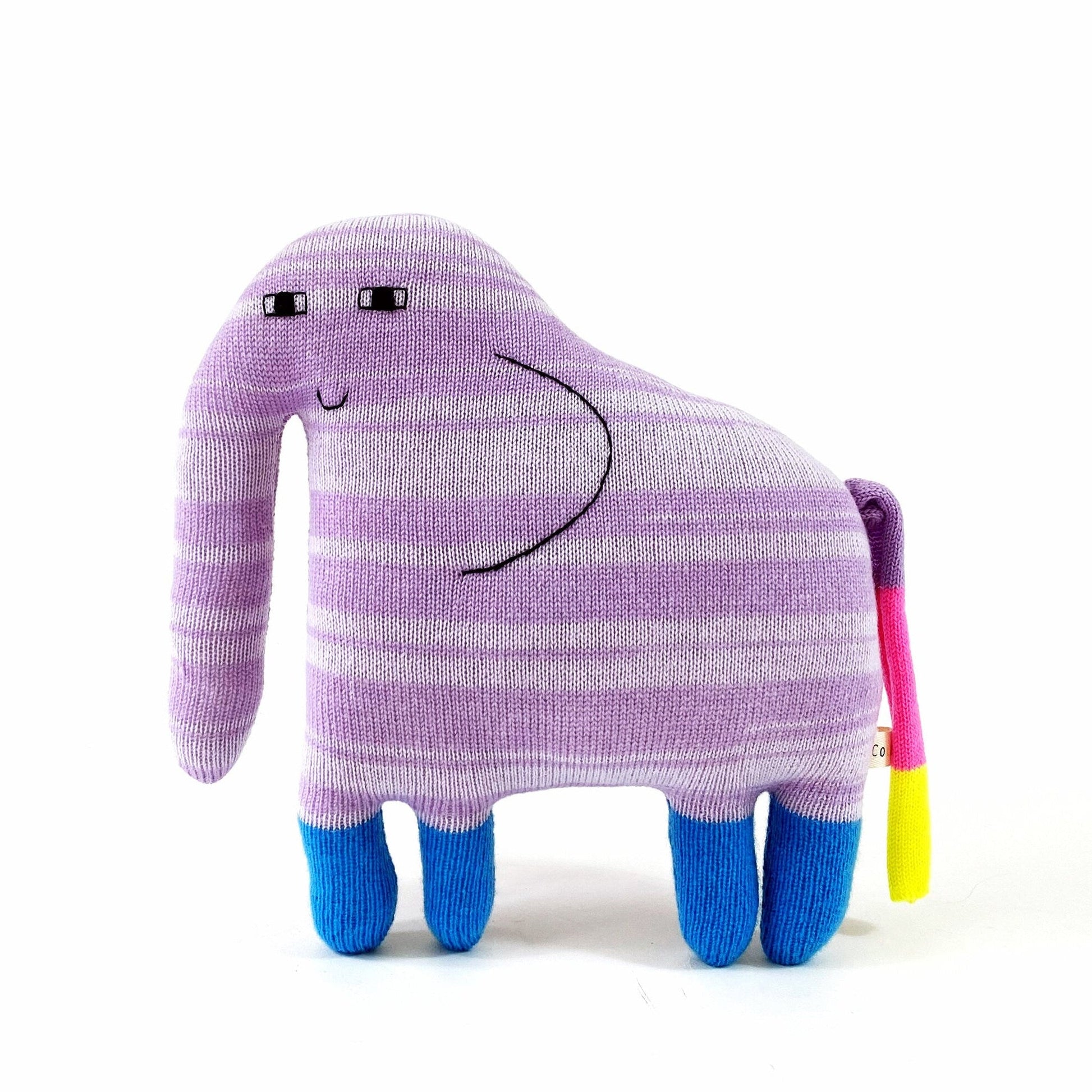 Purple and blue knitted elephant striped toy with a happy face on a white background
