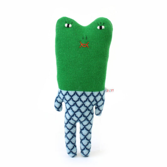 Green plush toy frog with a blue patterned body on a white background