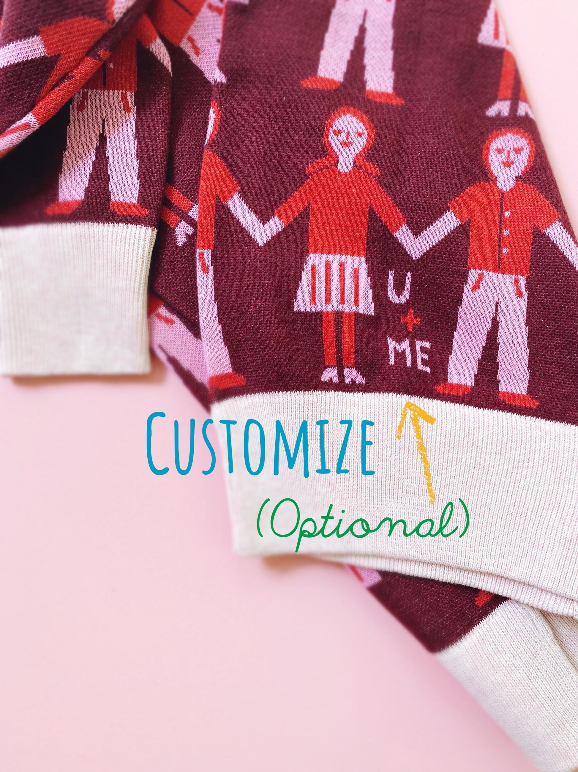 Textile with printed design of people holding hands and text 'CUSTOMIZE U ME' on a pink background.
