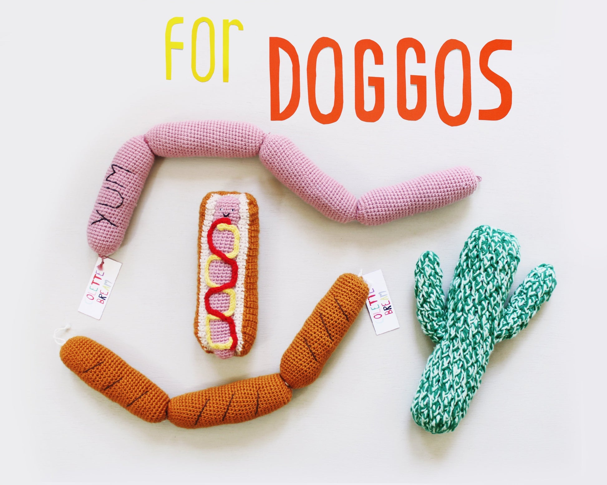 Dog toys shaped like a hot dog, bone, sausage links and cactus on a white background with 'For Doggos' text.