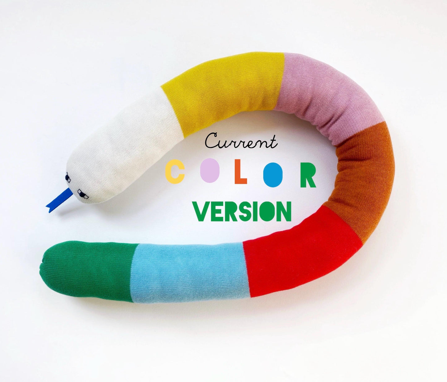 Colorful knitted snake-shaped pillow with 'Current Color Version' text on a white background