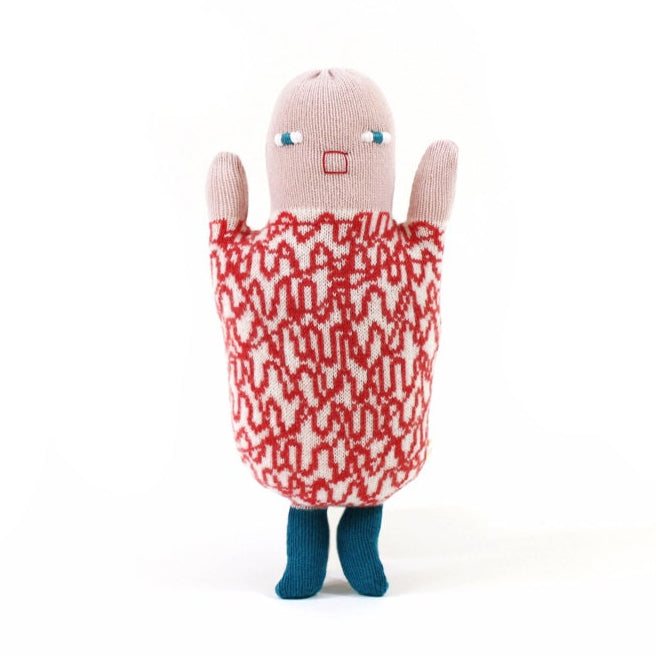Lambswool knitted plush toy doll with a red and white patterned body on a white background