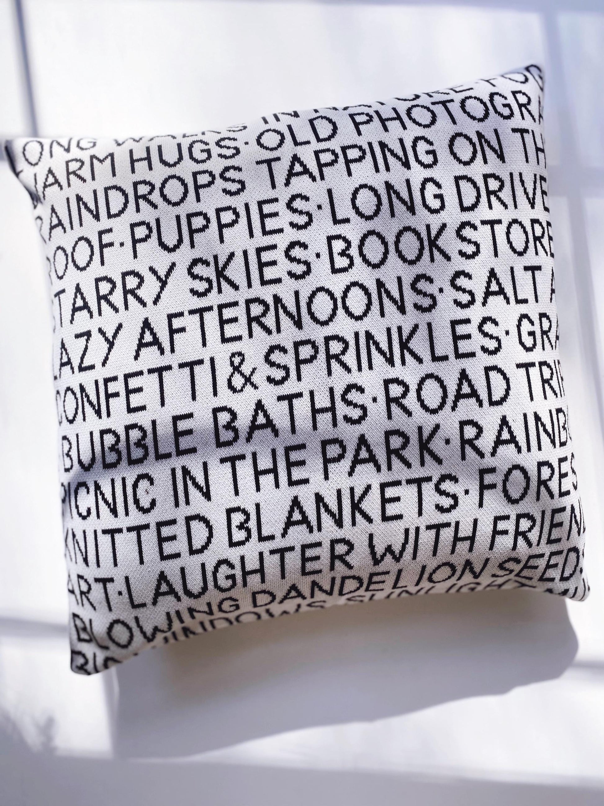 Decorative pillow with text on a white background