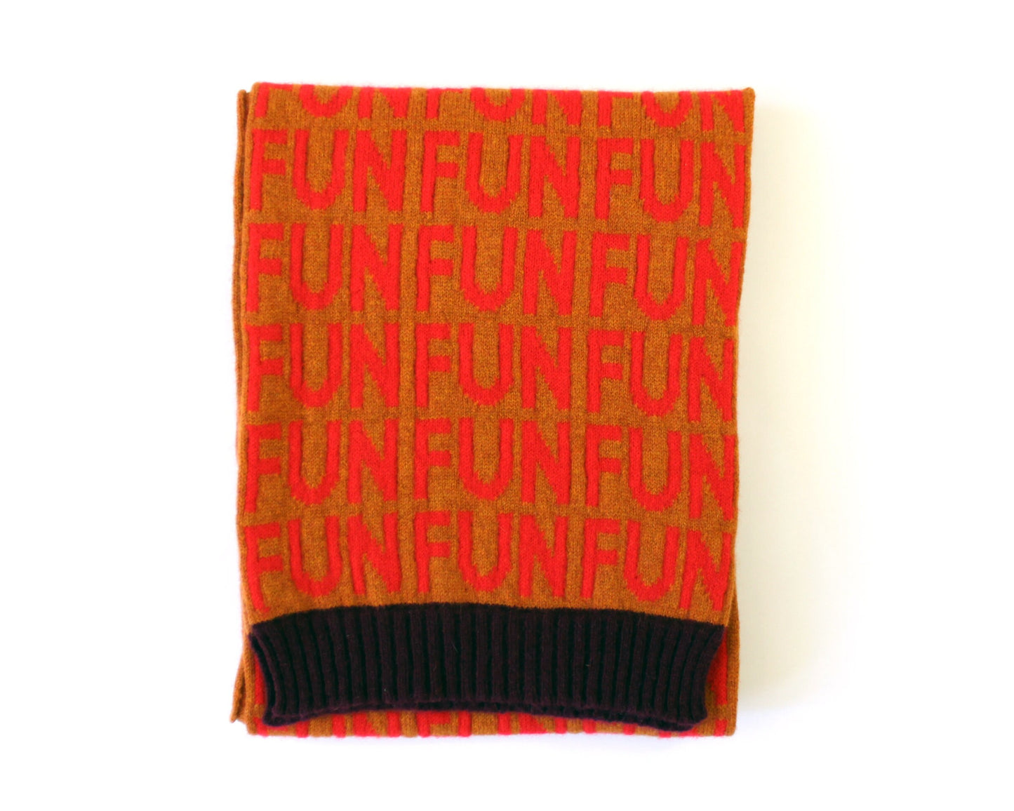 Knitted scarf with 'FUN' pattern in red on a white background