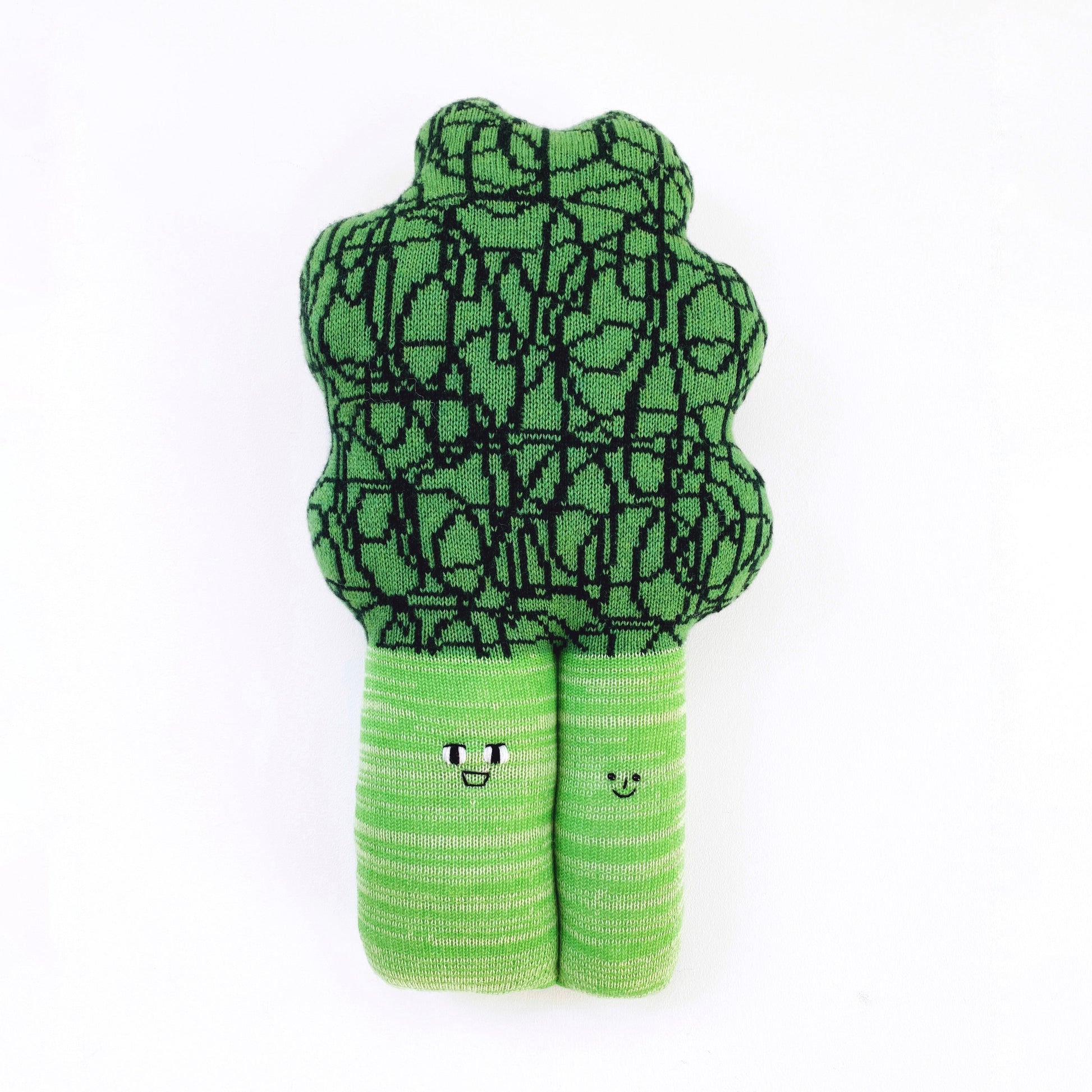 Soft knit lambswool green plush toy shaped like a broccoli on a white background