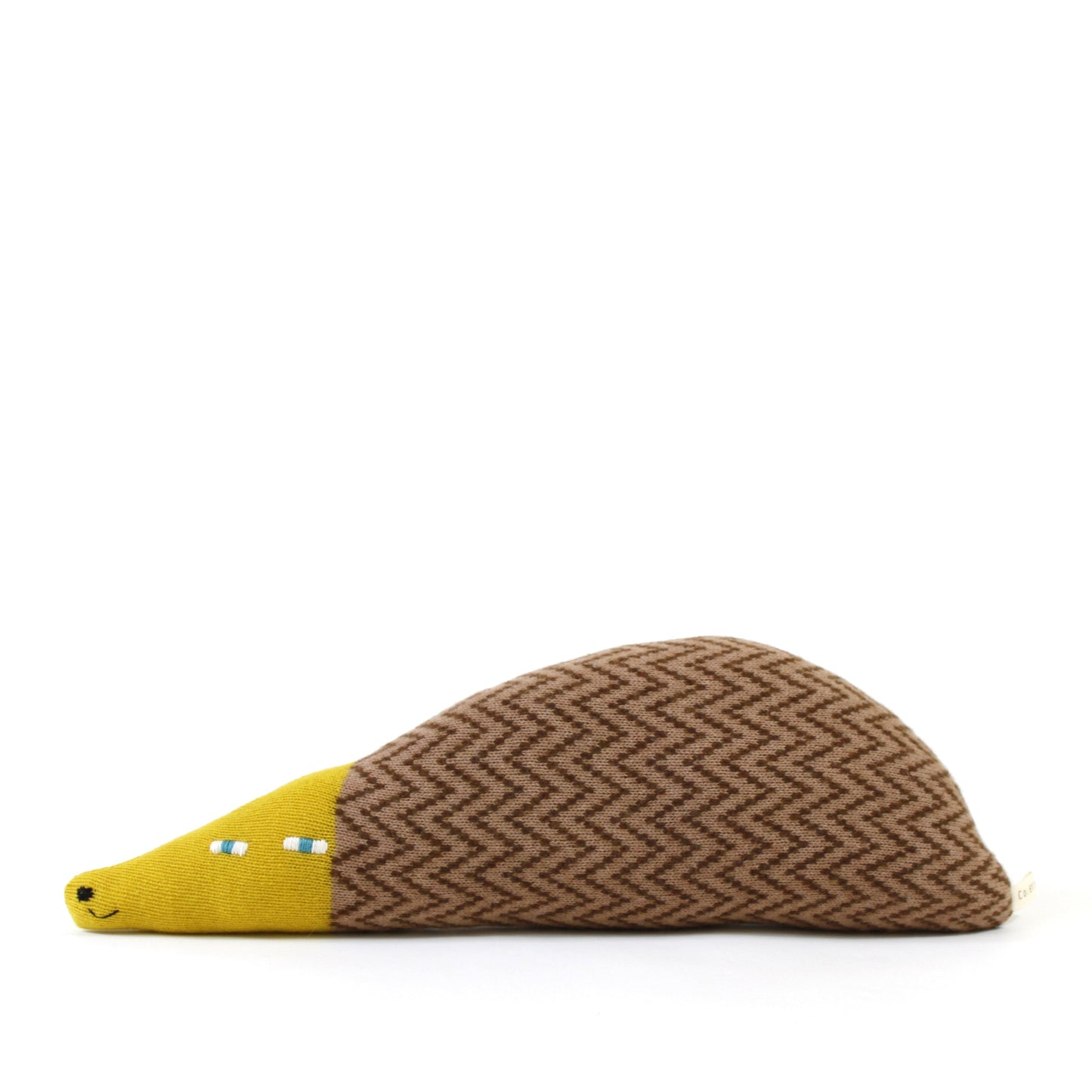 Knitted lambswool toy shaped like a hedgehog with brown body and yellow face on a white background