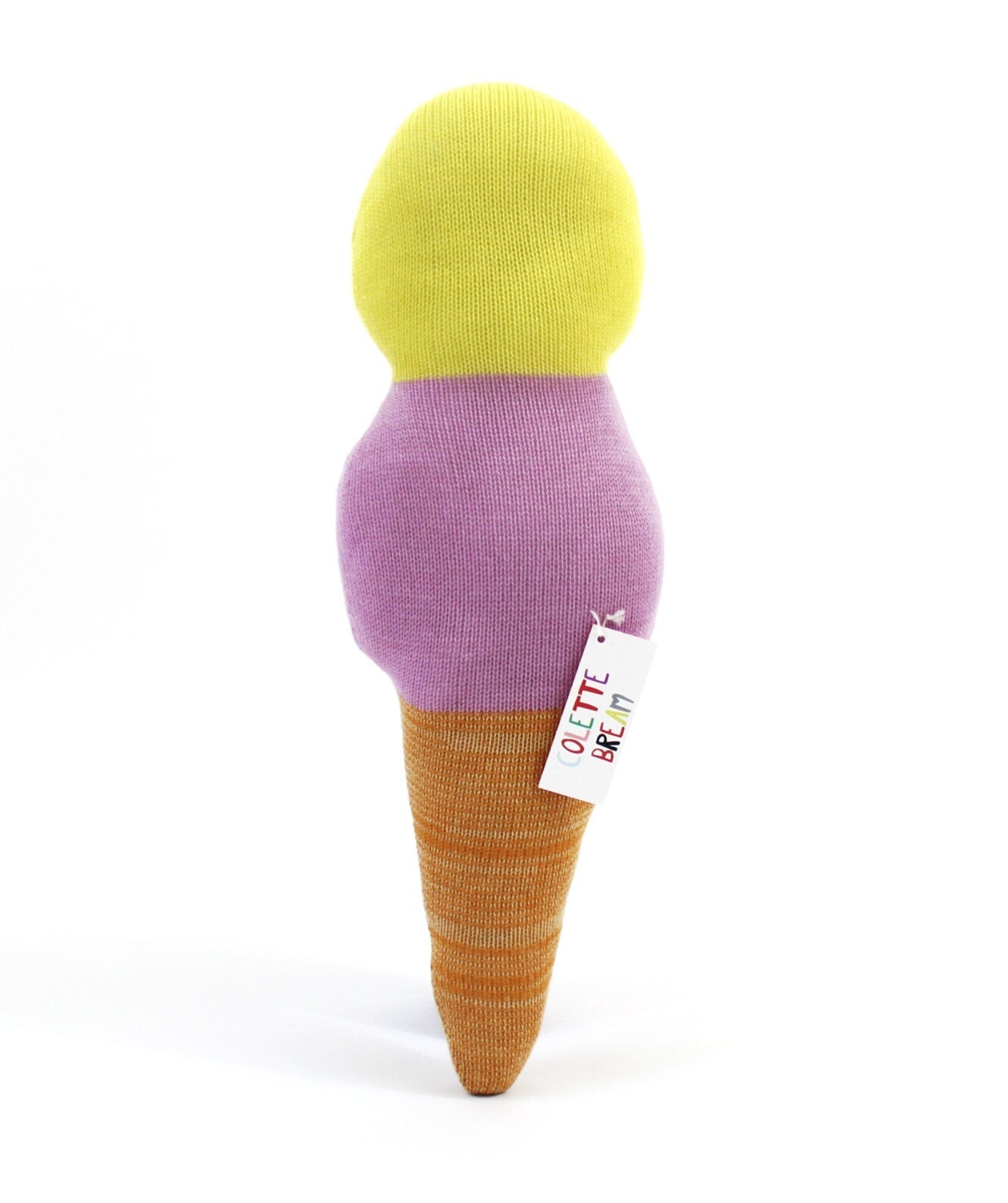 Toy resembling an ice cream cone with a yellow top, purple middle, and brown cone on a white background.