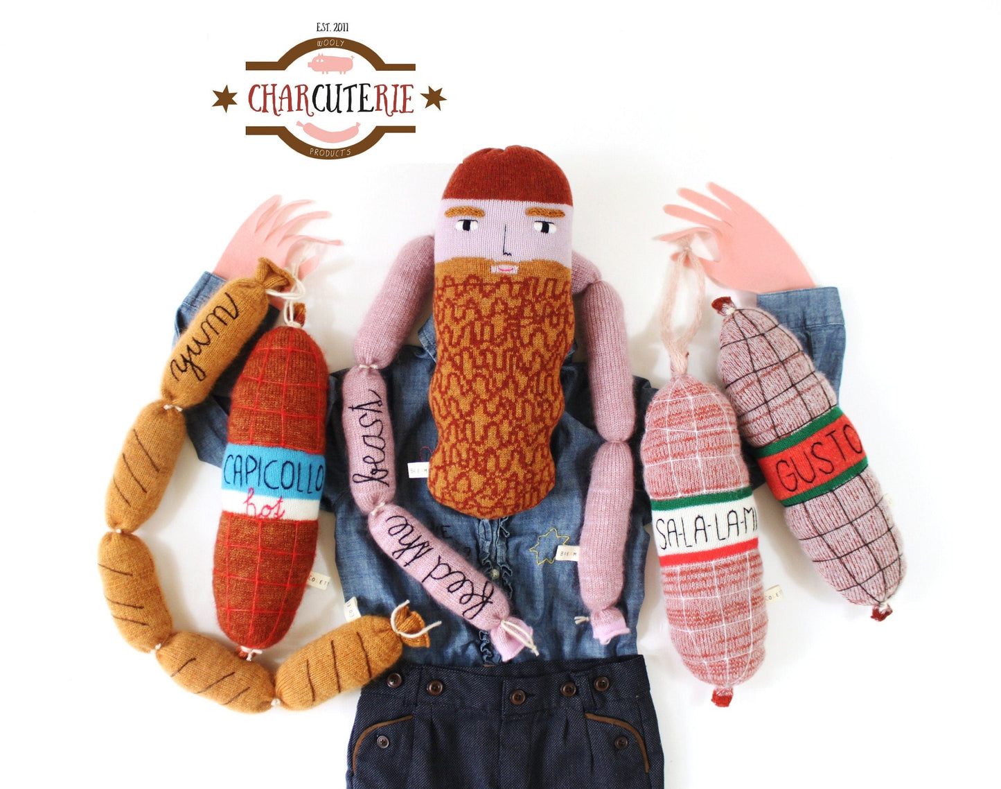 Textile art of a person with knitted sausages labeled with various types of sausage names, branded 'Charcuterie'.
