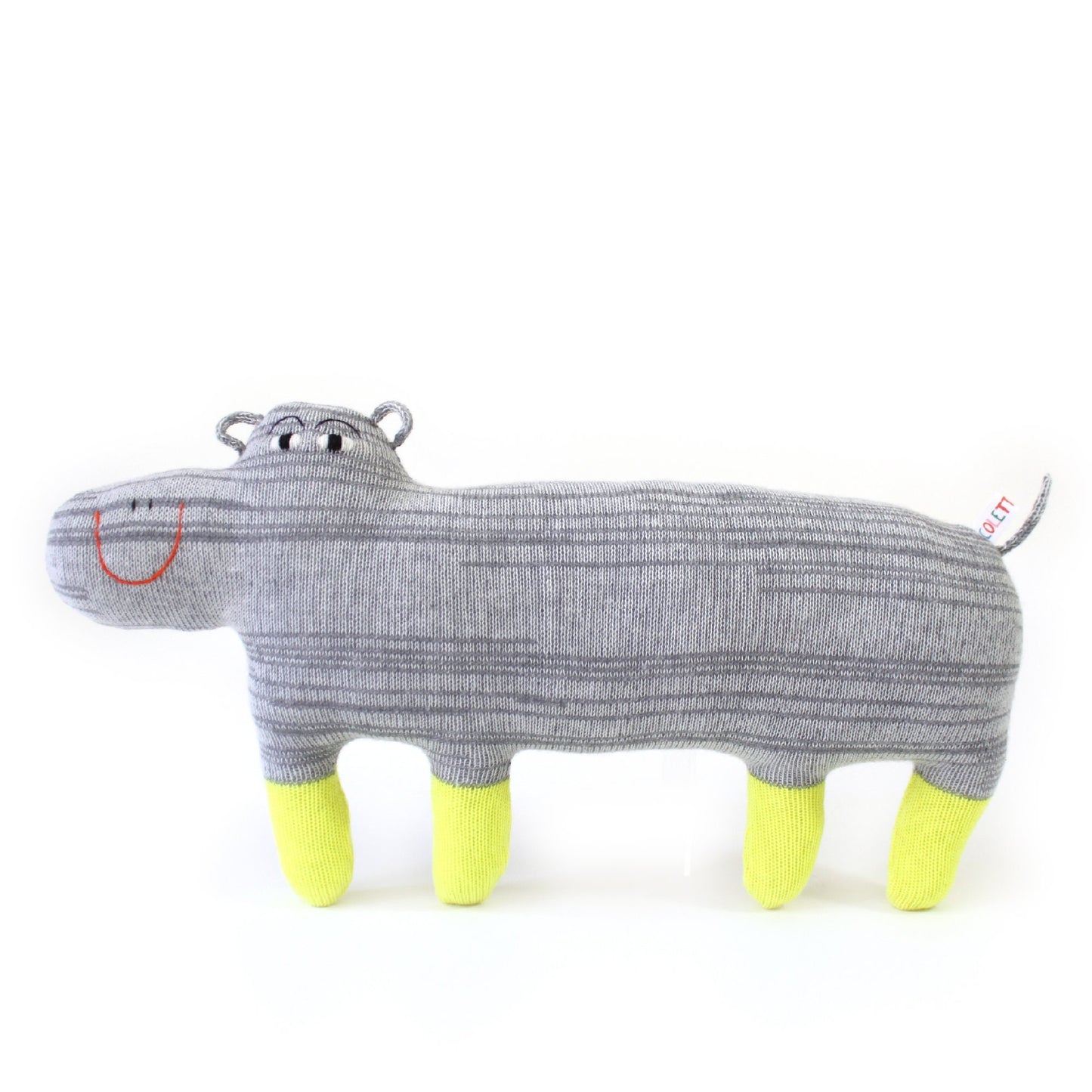 Gray happy hippo knitted lambswool toy with yellow feet on a white background