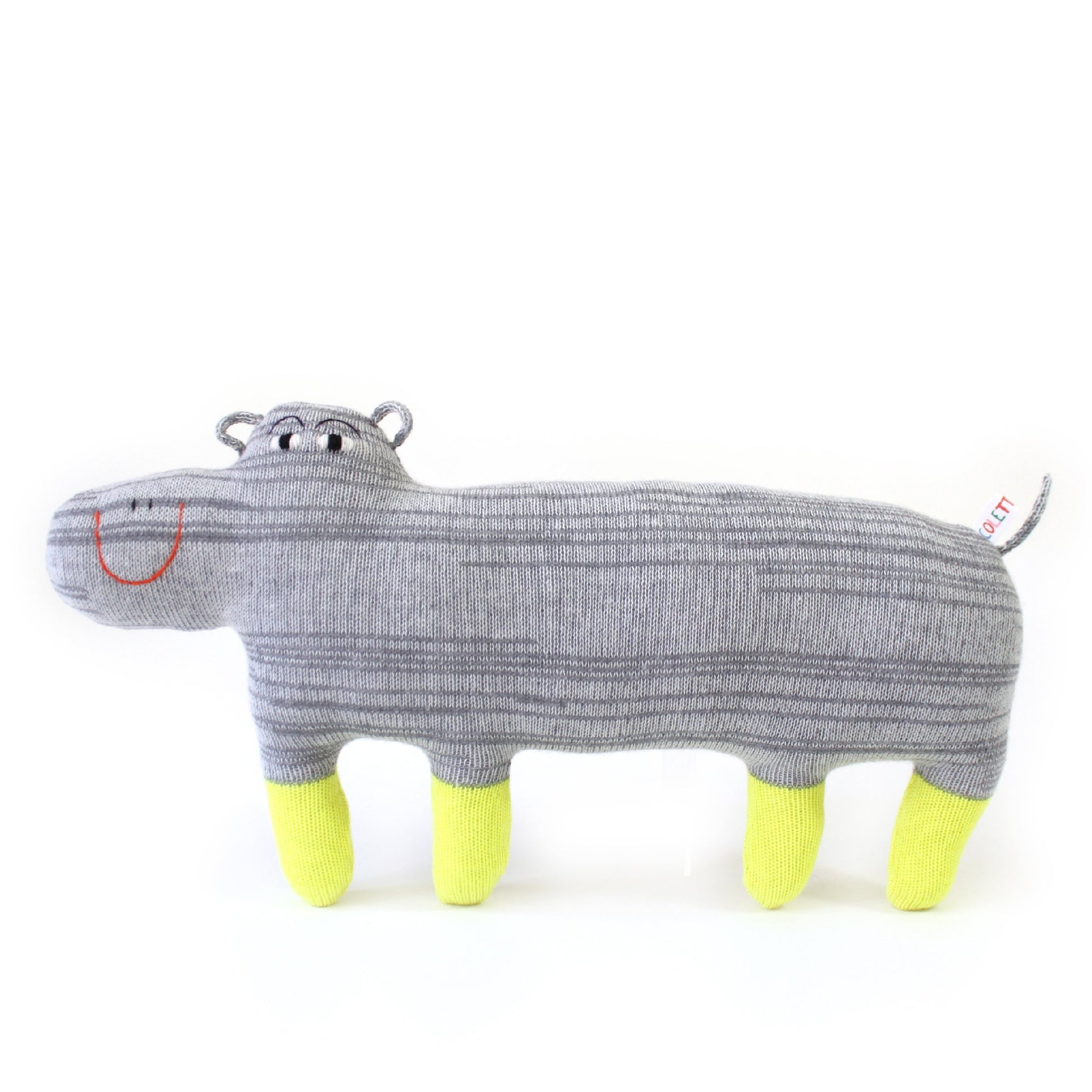Gray happy hippo knitted lambswool toy with yellow feet on a white background