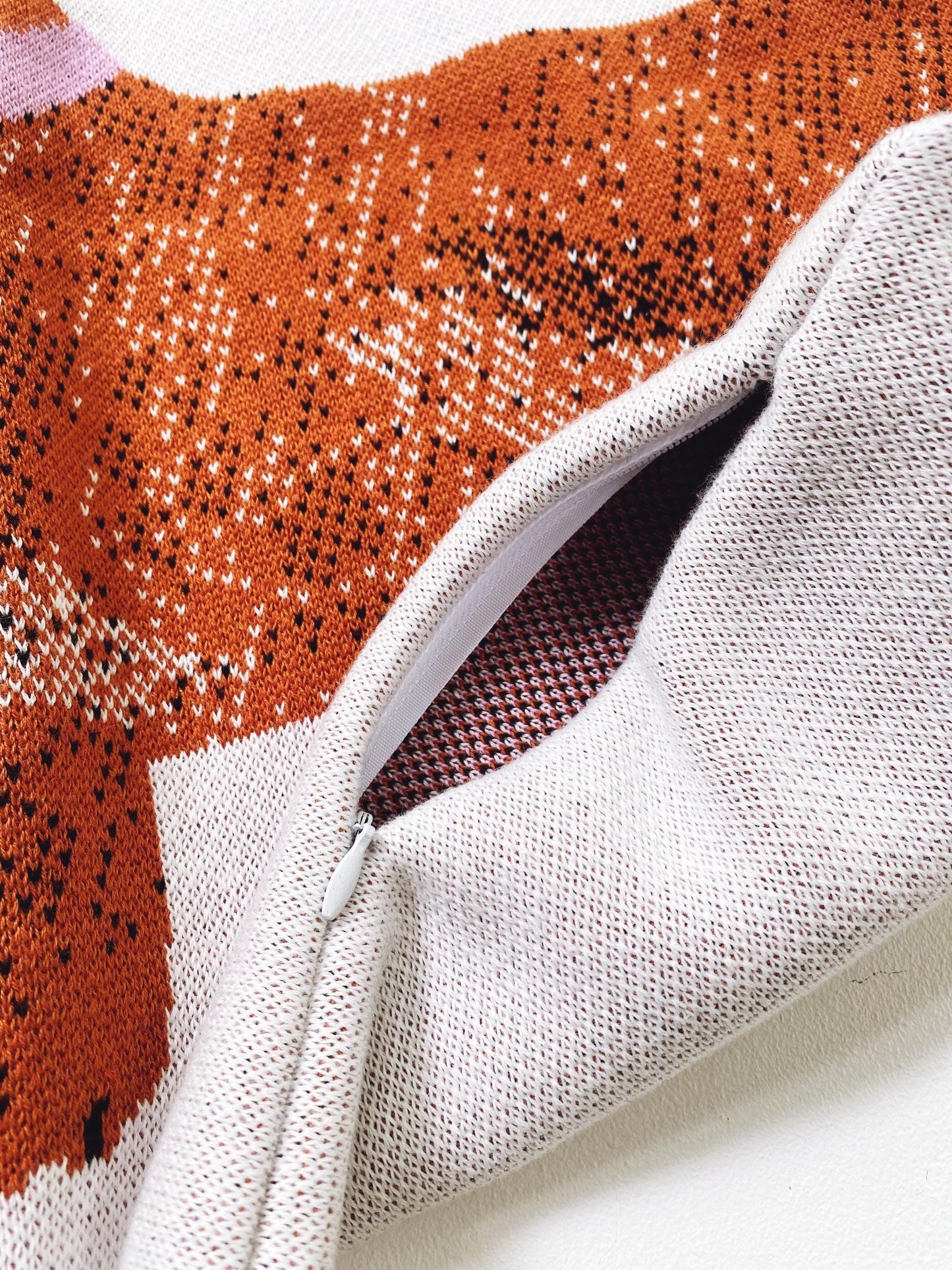 Close-up of a fabric with a patterned design on a white background