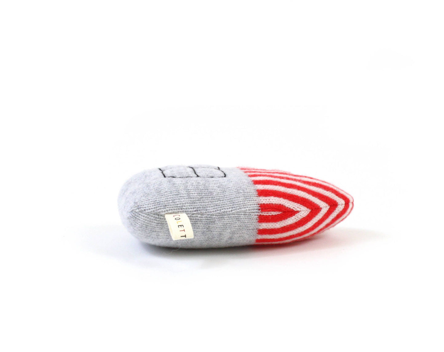 Gray and red baby rattle toy with a brand label on a white background
