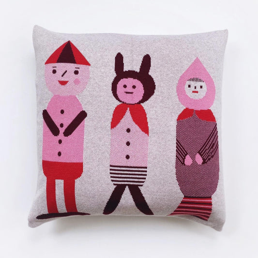 Decorative pillow with cartoon-like characters on a white background