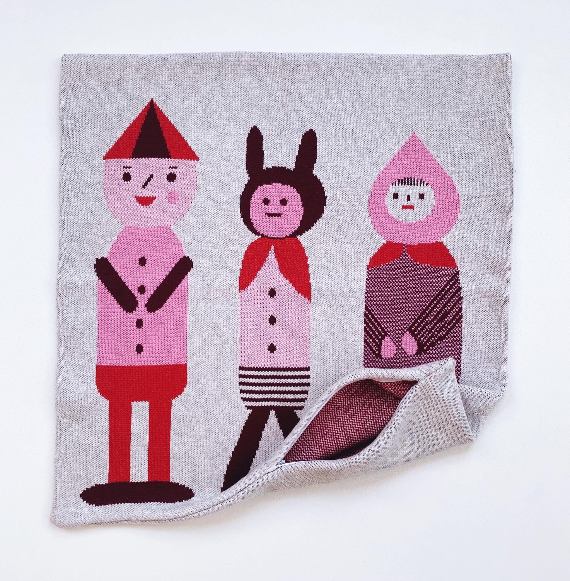 Textile with cartoon characters on a gray background